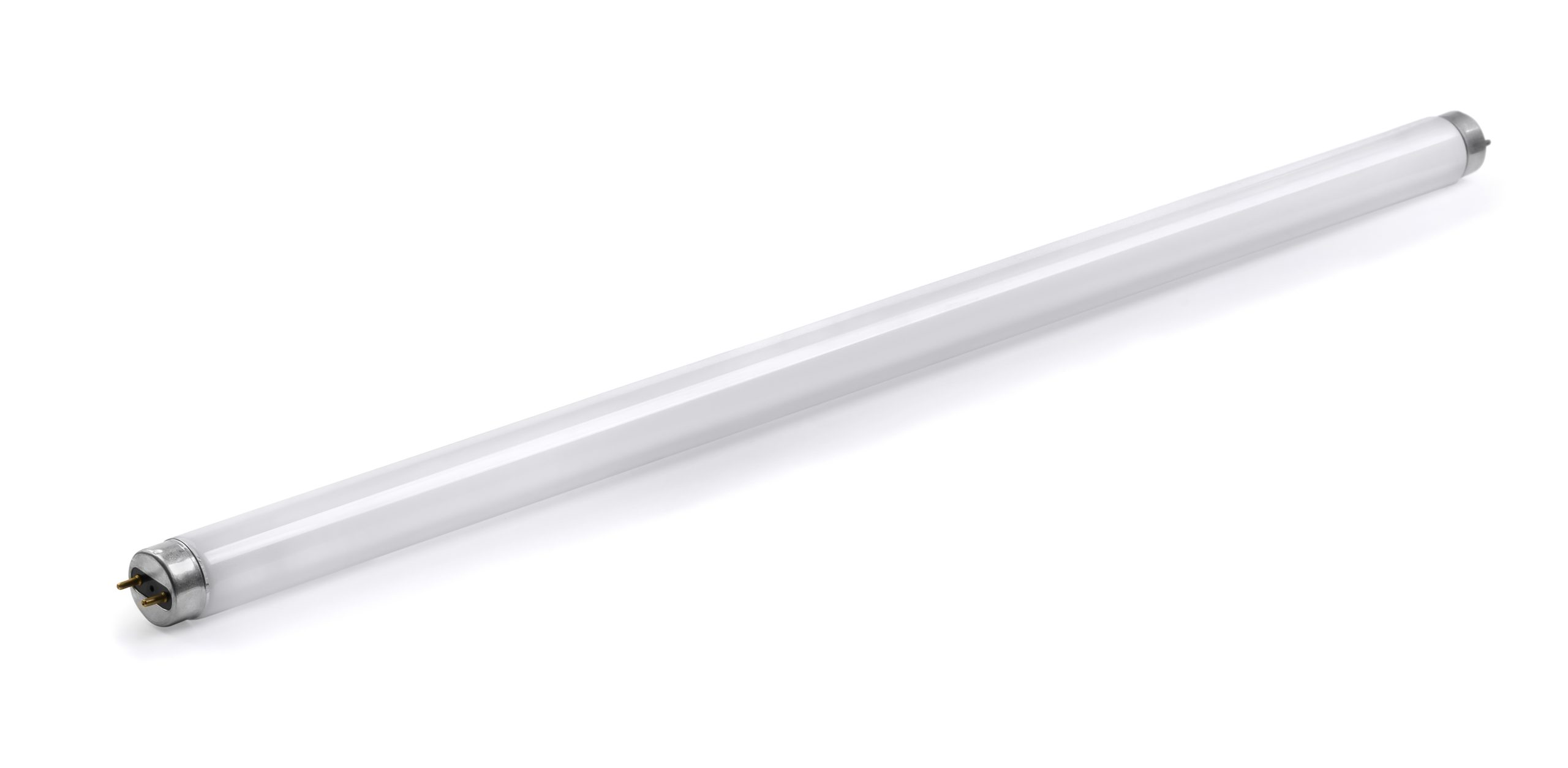 Fluorescent Tubes A single, white fluorescent tube light bulb lying on a plain white surface.